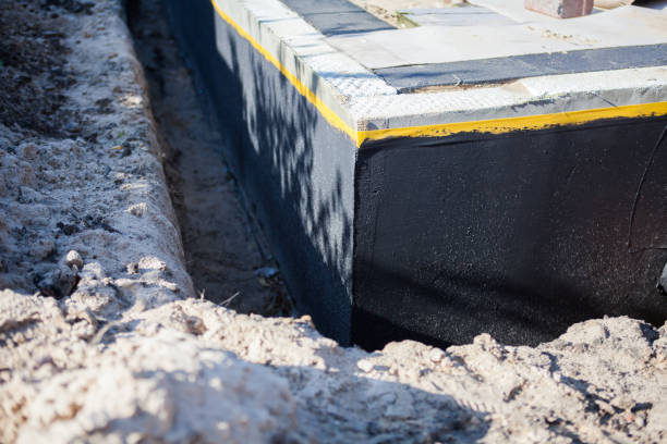 Professional Waterproofing technician working in Greenleaf, WI